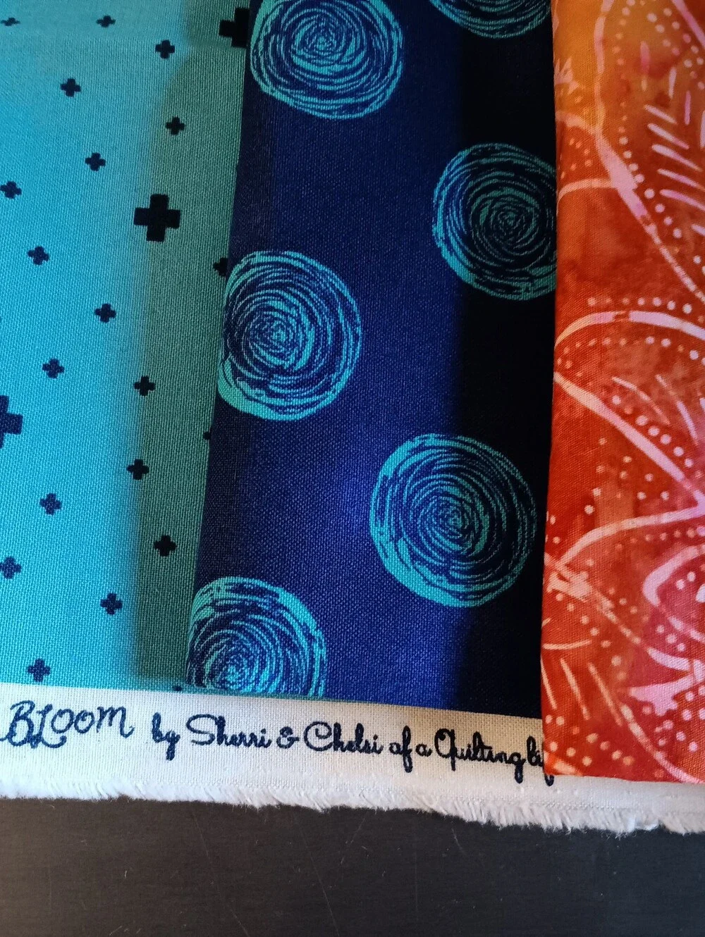 Fabric coordinating prints cotton = 3 yards  + buttons (set)
